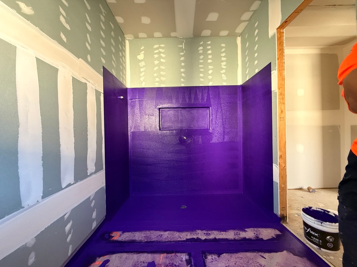 Waterproofing membrane applied to bathroom walls